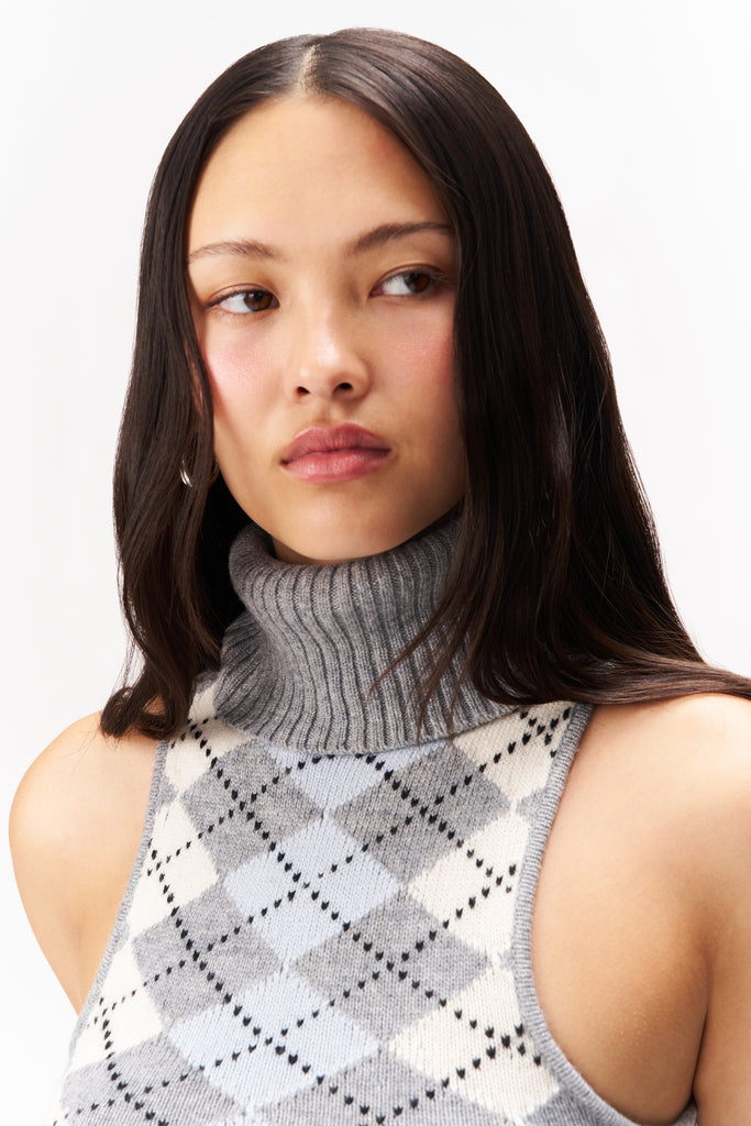 HANA SLEEVELESS TURTLENECK TOP IN BLUE ARYLE