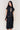 Eda Satin Midi Skirt in Black
