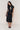 Eda Satin Midi Skirt in Black
