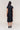 Eda Satin Midi Skirt in Black